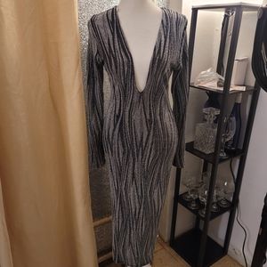 Silver glitter and black dress, size medium. Alot of stretch